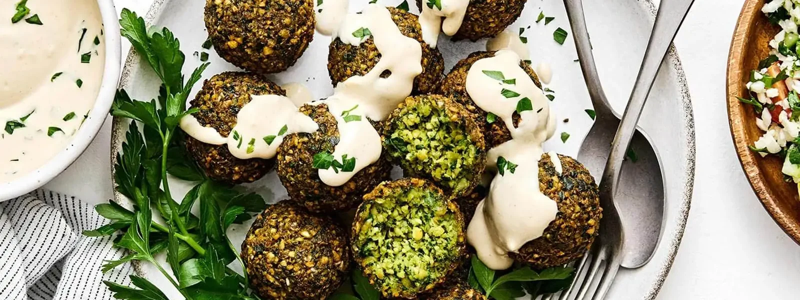 Crispy golden falafel balls served with tahini sauce
